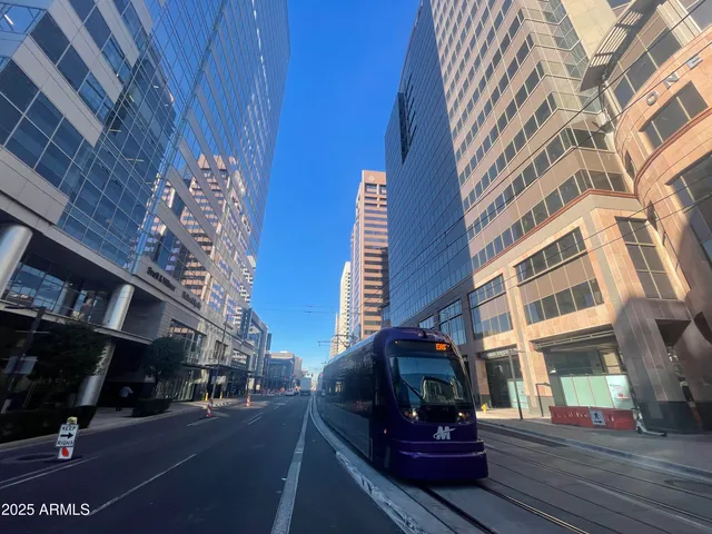 a front view of a building with street view