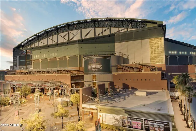 a view of a swimming pool with a yard