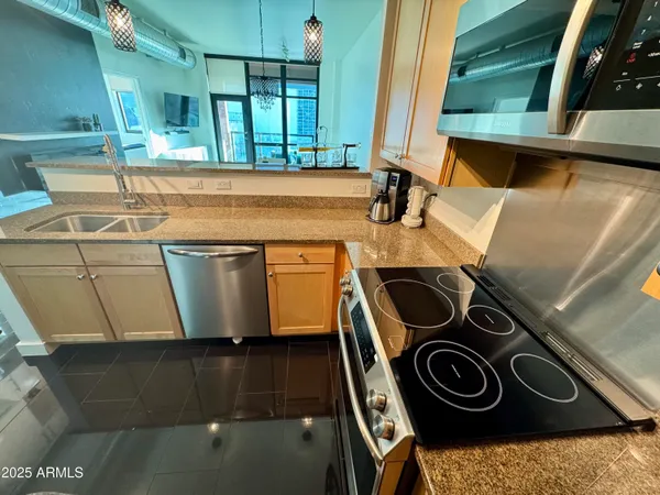 a bathroom with a sink and a washing machine