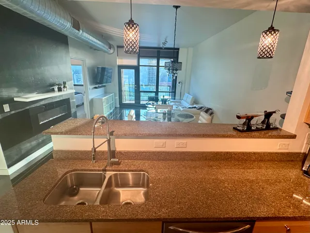 a living room with furniture and a table