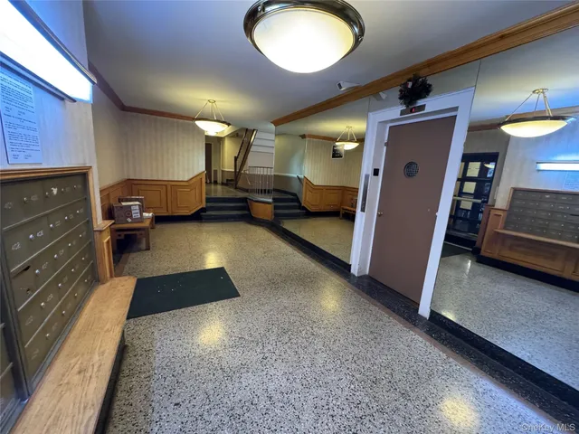 a spacious bathroom with a tub and a sink