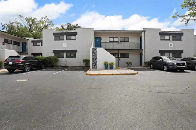 a view of car parked in front of house