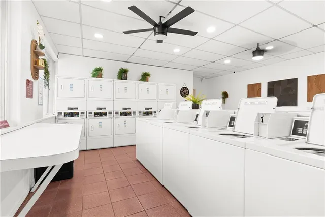 a kitchen with cabinets and window