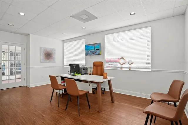 a view of a dining room with furniture window and outside view