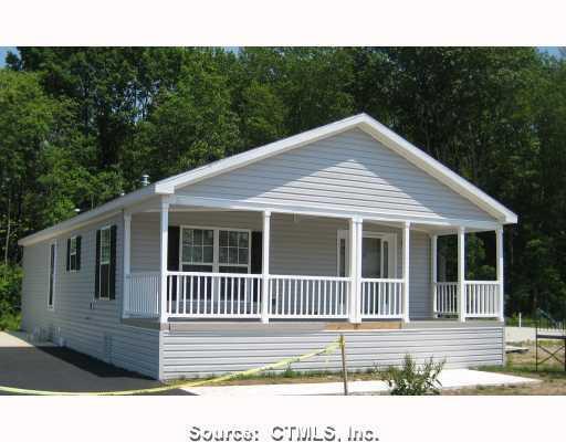 8 Cliff Road Ledyard, CT 06339 - Photo 1 of 1 a front view of a house with garage