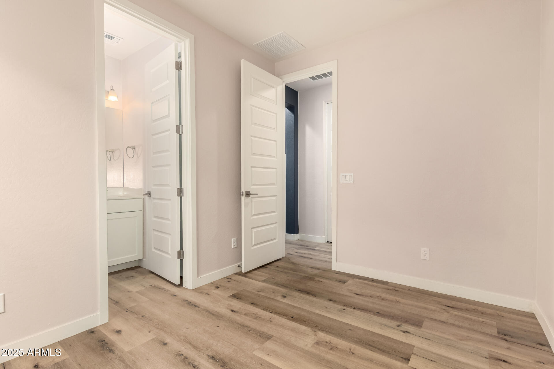4235 North 26th Street, Unit 5 Phoenix, AZ 85016 - Photo 24 of 41 a view of a bathroom with wooden floor