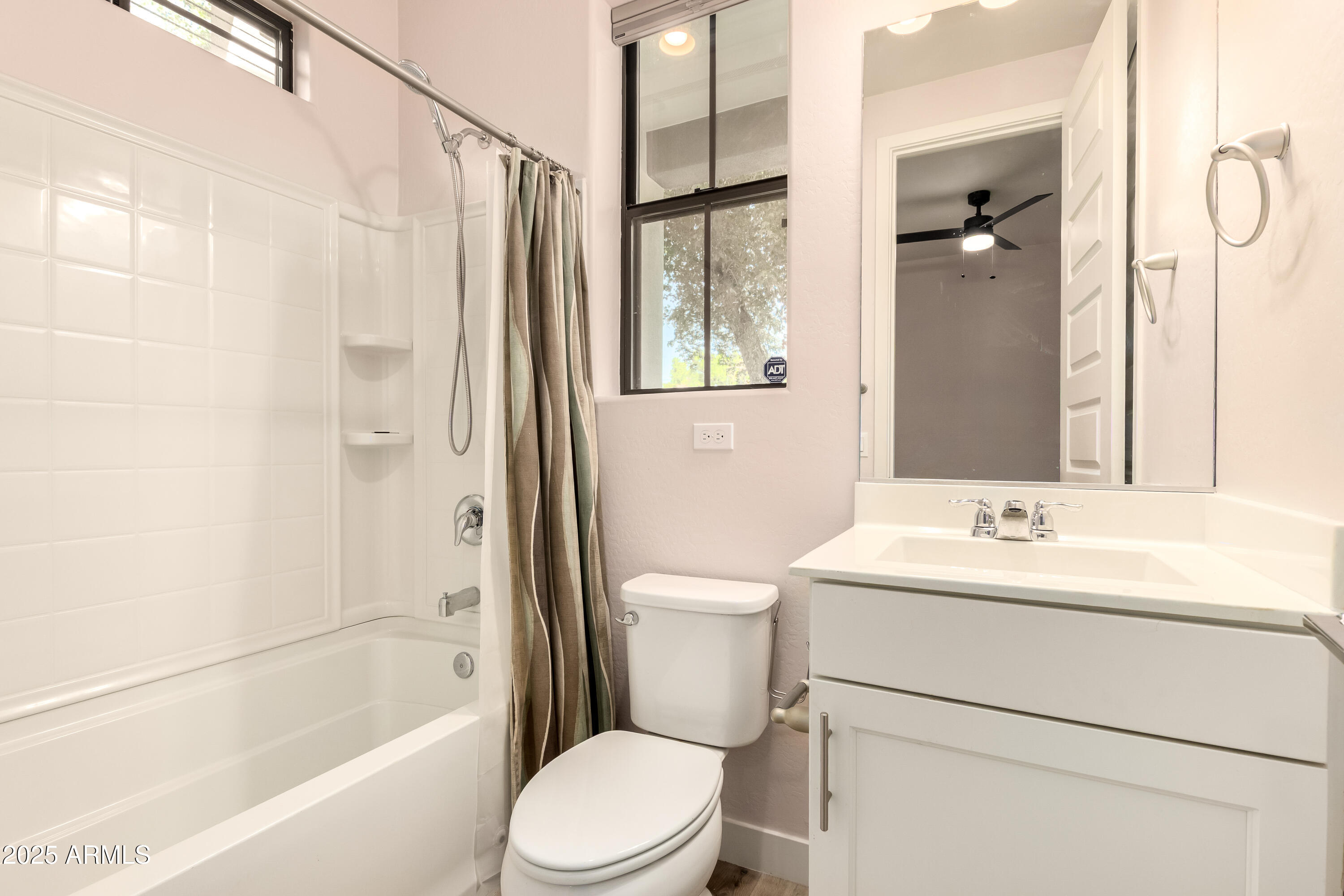 4235 North 26th Street, Unit 5 Phoenix, AZ 85016 - Photo 5 of 41 a bathroom with a sink toilet and shower