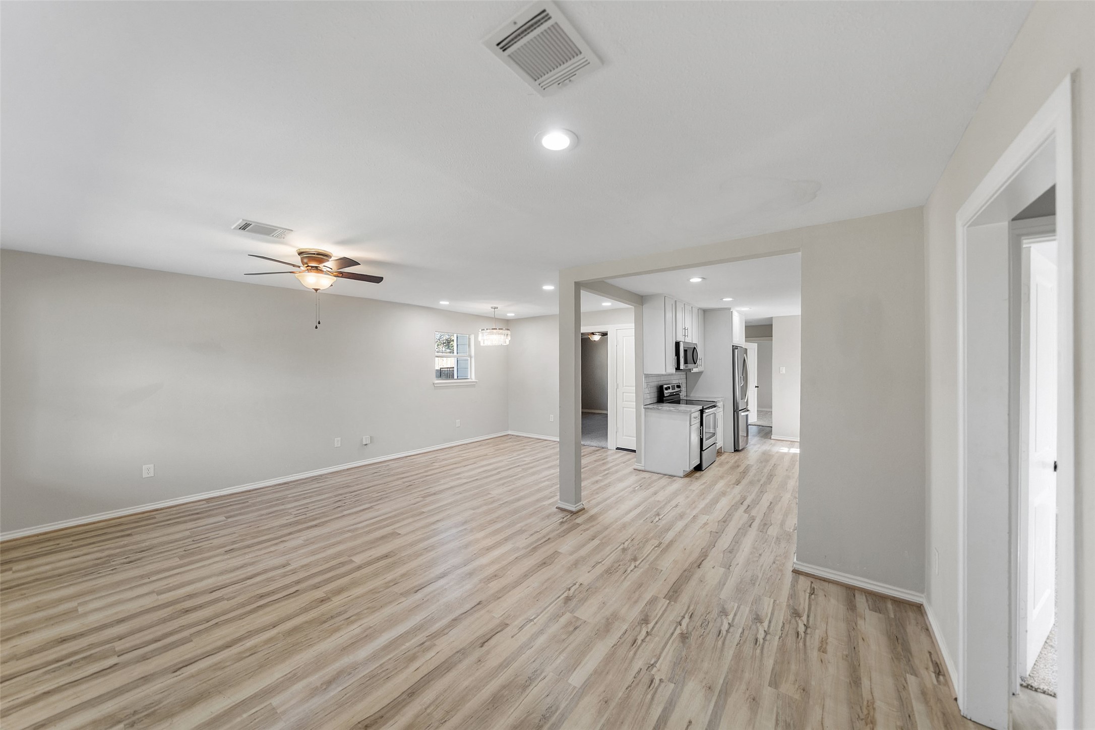 7019 Sur Court Houston, TX 77033 - Photo 8 of 22 a view of a room with wooden floor
