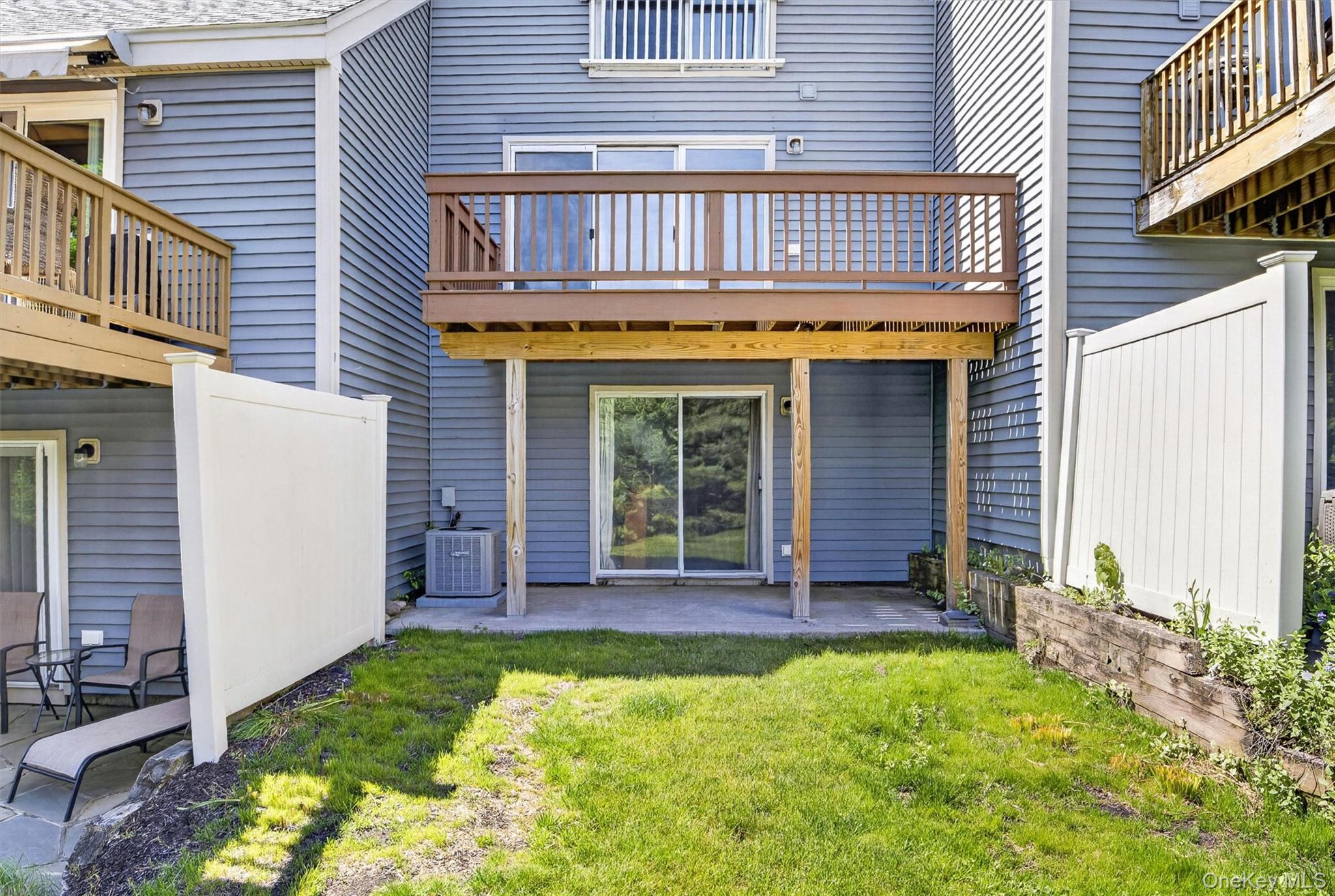 116 Fields Lane Peekskill, NY 10566 - Photo 31 of 40 a view of an house with porch and furniture
