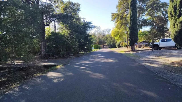 a view of road with trees