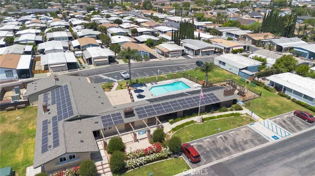 an aerial view of a city with streets and houses