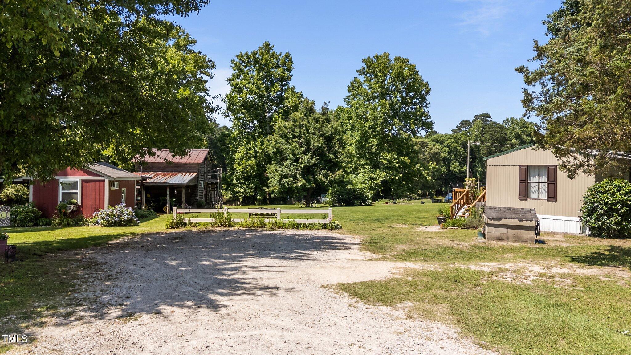 1355 Sykes Road Spring Hope, NC 27882 - Photo 5 of 39 4-web-or-mls-DJI_20250603143949_0750_D