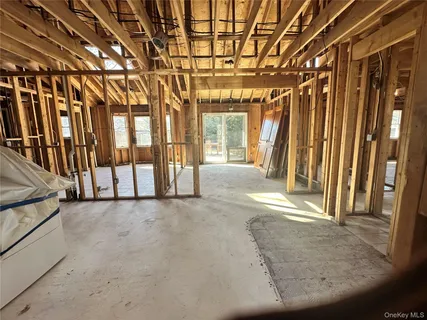 a view of an empty room with a balcony