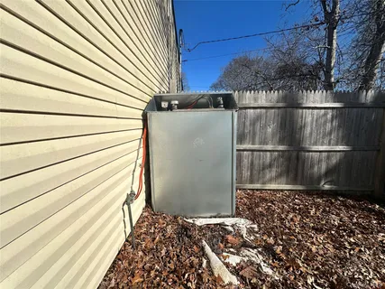 a view of a backyard with sitting area