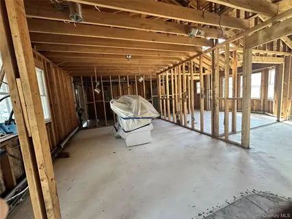 a view of a room with wooden walls