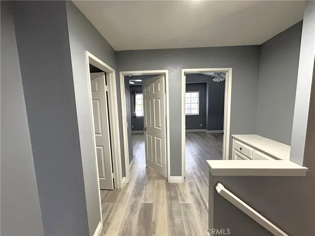 a view of a bathroom from the hallway