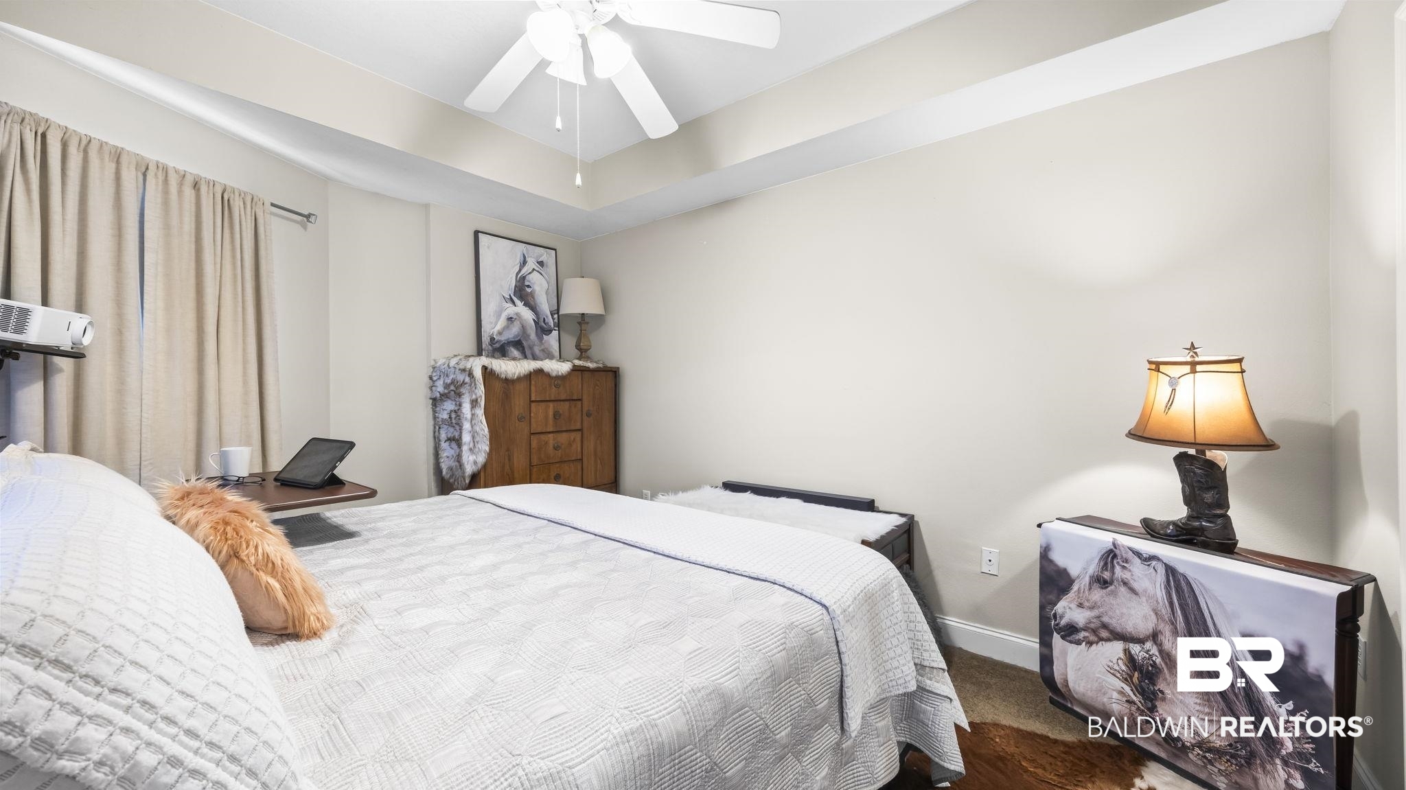 27800 Canal Road, Unit 313 Orange Beach, AL 36561 - Photo 8 of 23 Bedroom featuring ceiling fan and carpet floors