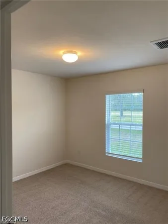 an empty room with a window