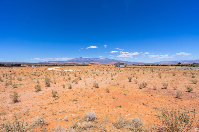3306 South Endless Trail, Unit 33 Hurricane, UT 84737 - Photo 8 of 27 Expansive undeveloped desert terrain with scattered low-lying shrubs