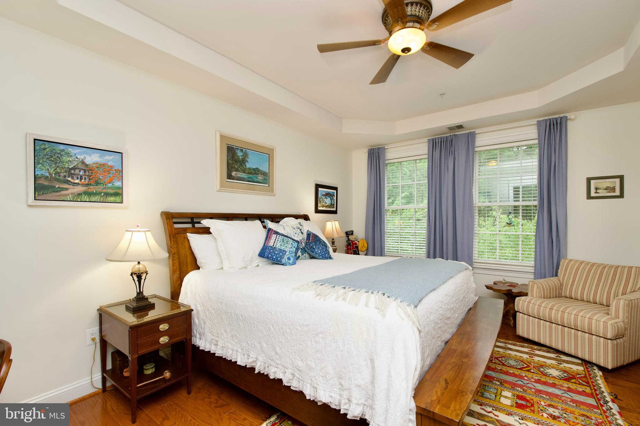 1781 Chain Bridge Road, Unit 302 McLean, VA 22102 - Photo 15 of 39 a bed room with a bed and a couch