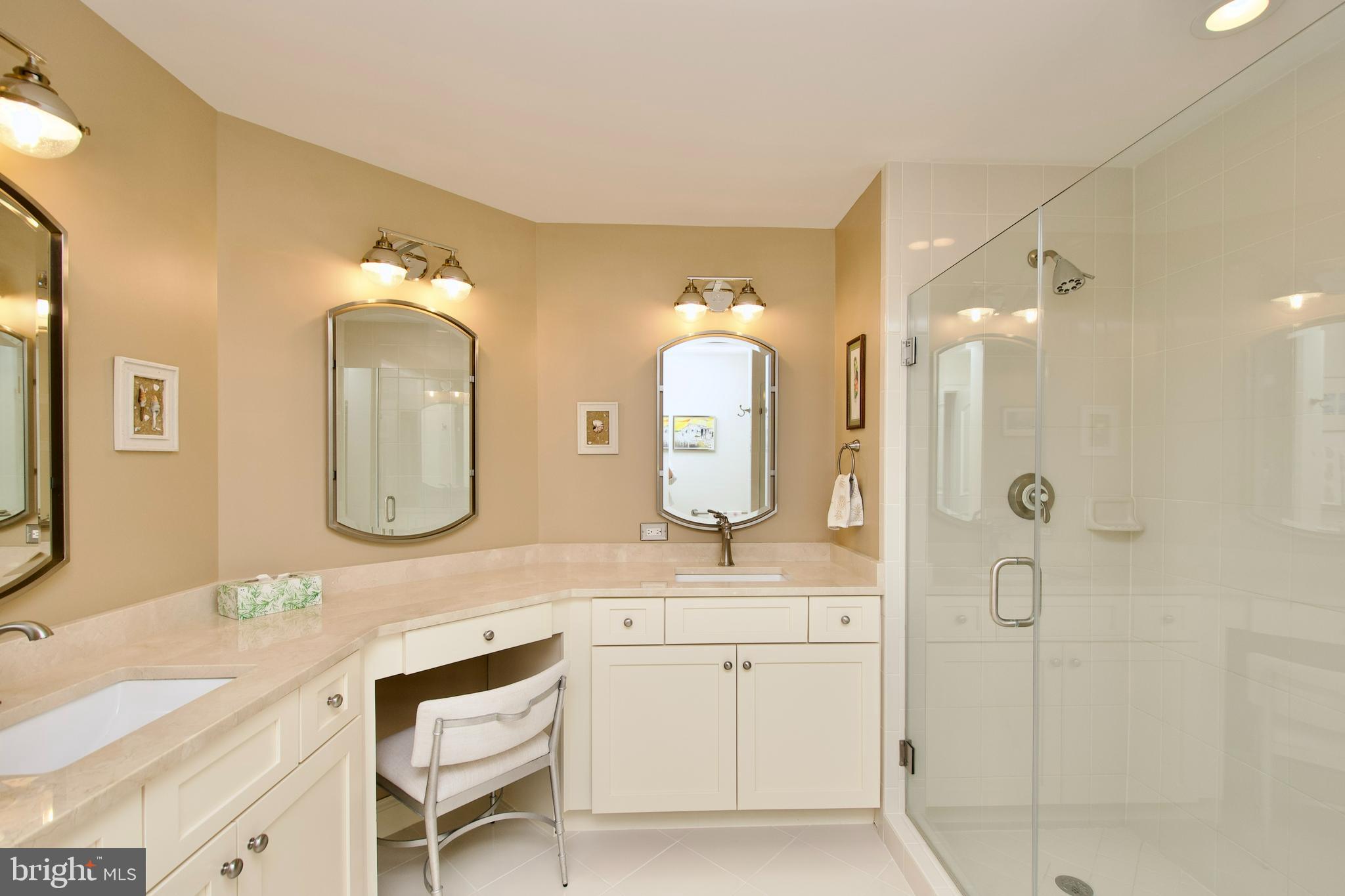 1781 Chain Bridge Road, Unit 302 McLean, VA 22102 - Photo 18 of 39 a spacious bathroom with a double vanity sink mirror and double