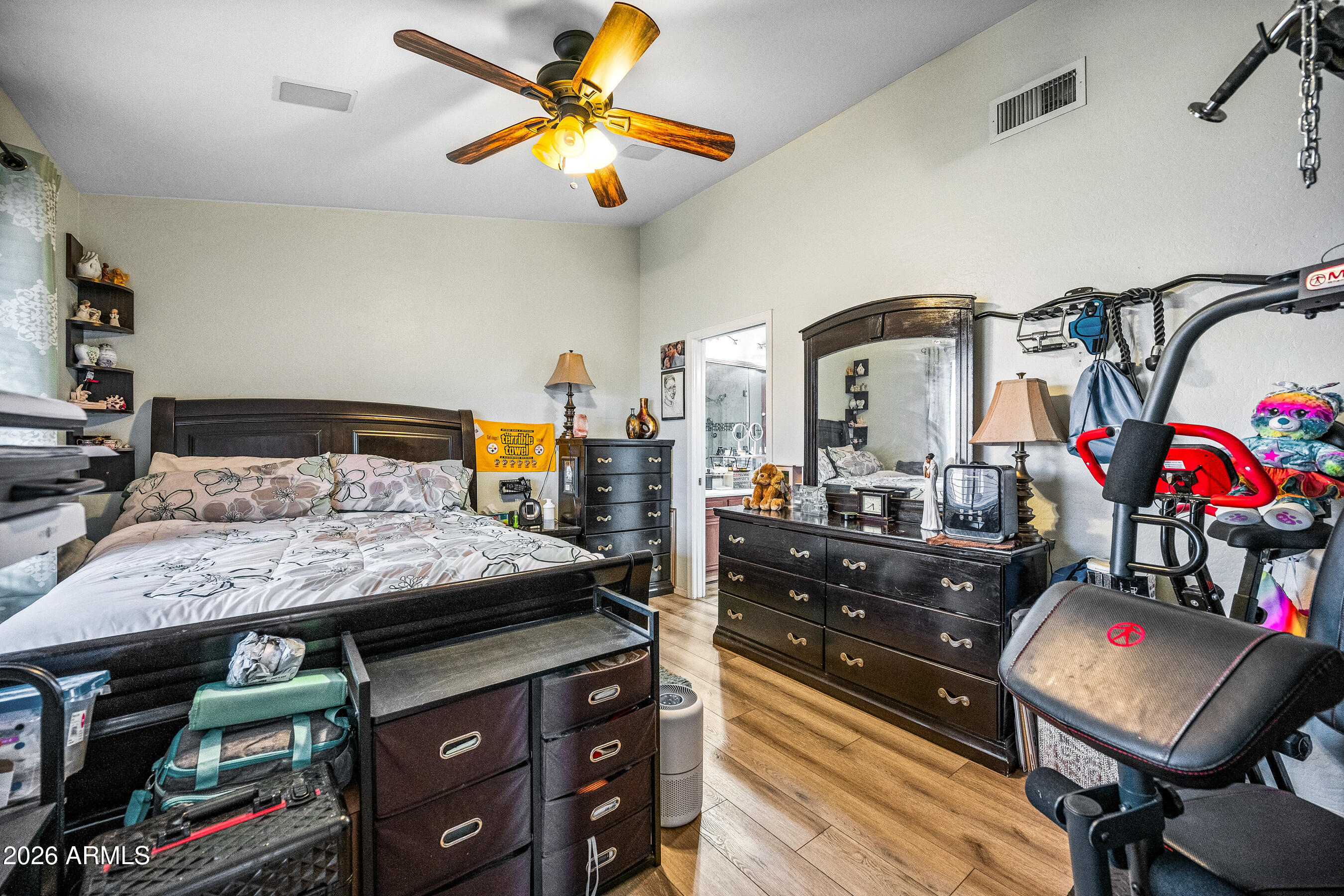 1260 South Lindsay Road, Unit 38 Mesa, AZ 85204 - Photo 11 of 23 a bedroom with a bed and furniture