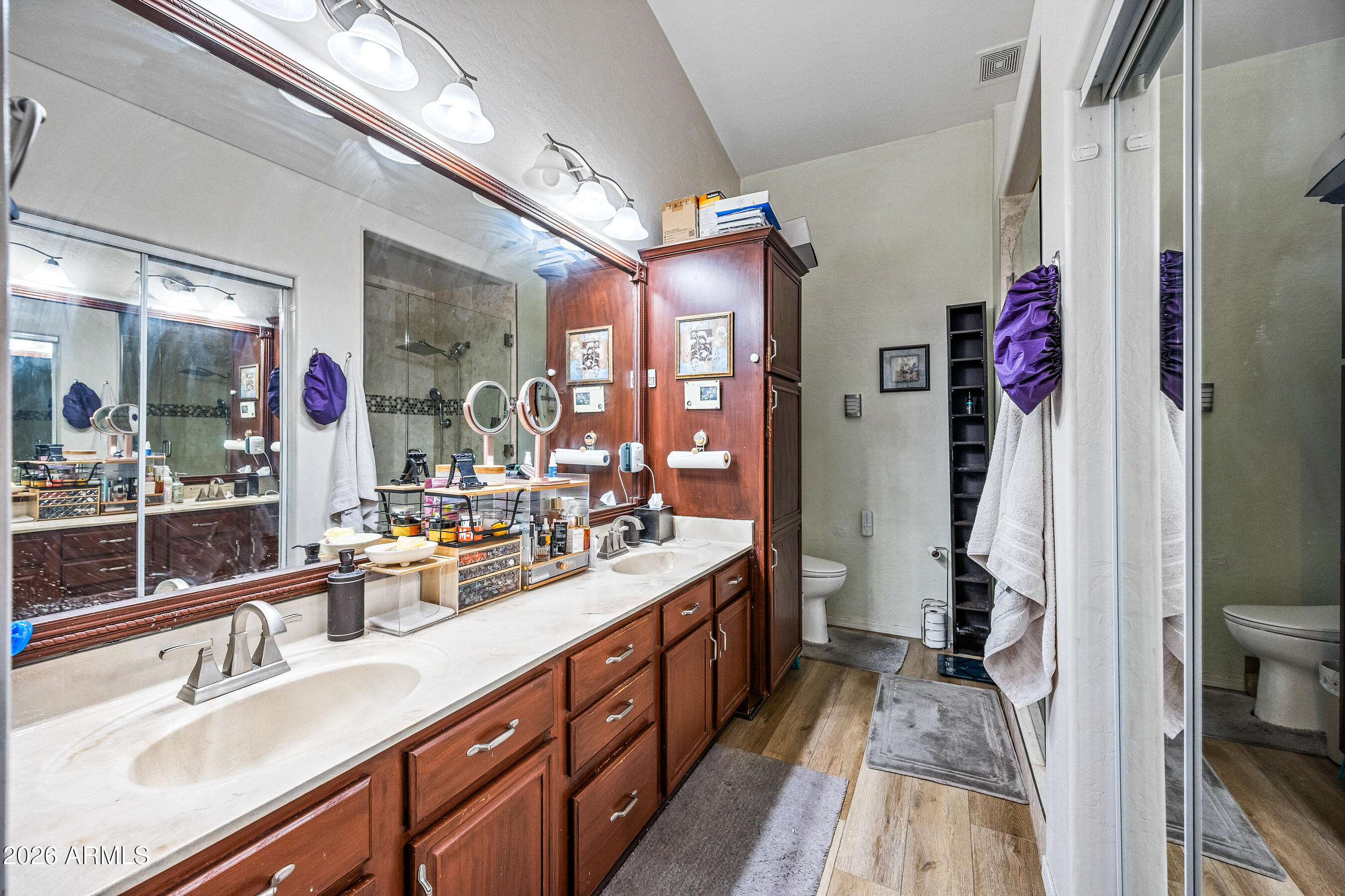 1260 South Lindsay Road, Unit 38 Mesa, AZ 85204 - Photo 12 of 23 a spacious bathroom with double vanity and a shower