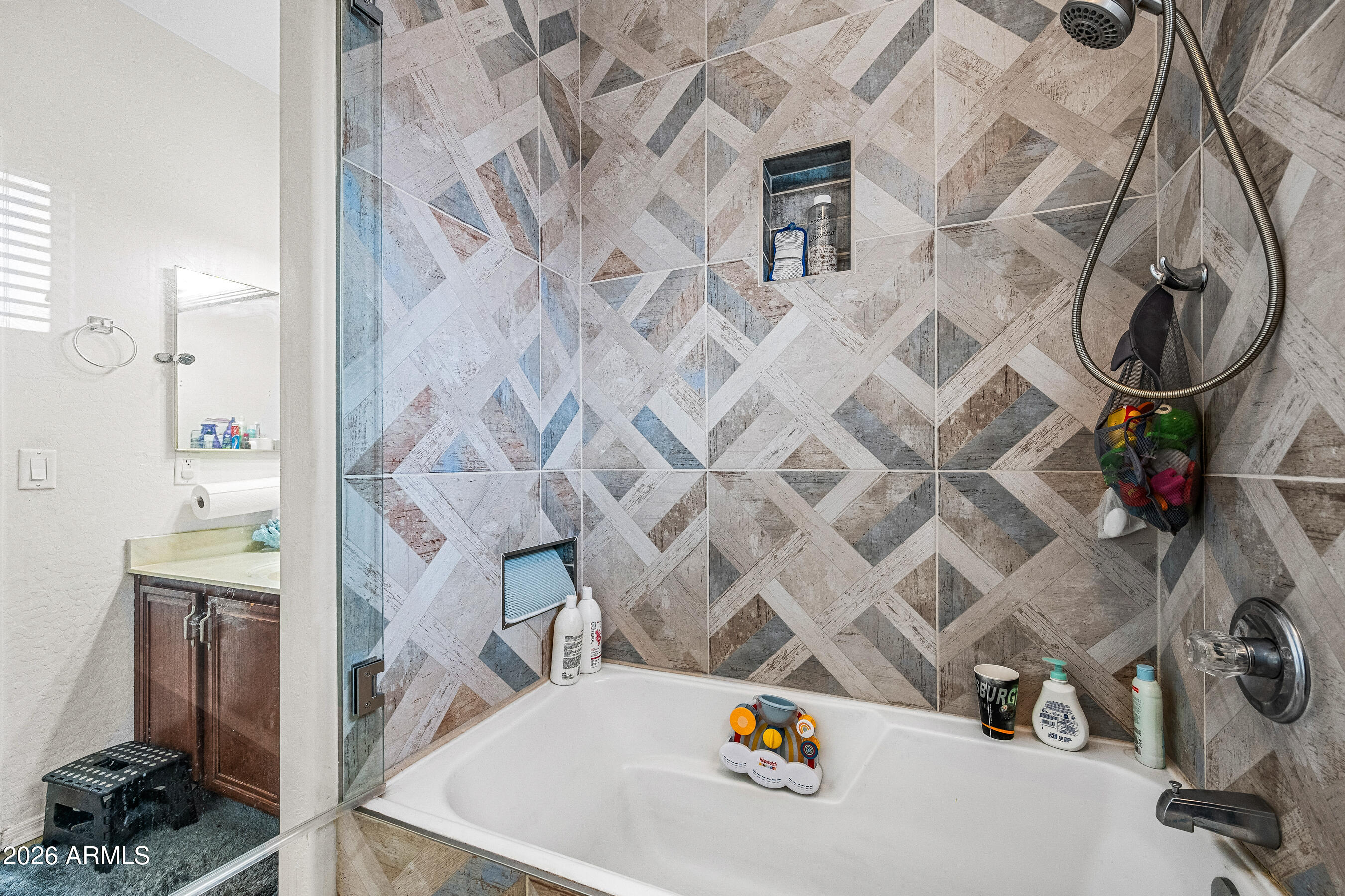 1260 South Lindsay Road, Unit 38 Mesa, AZ 85204 - Photo 17 of 23 a picture of a bathroom with sink and mirror