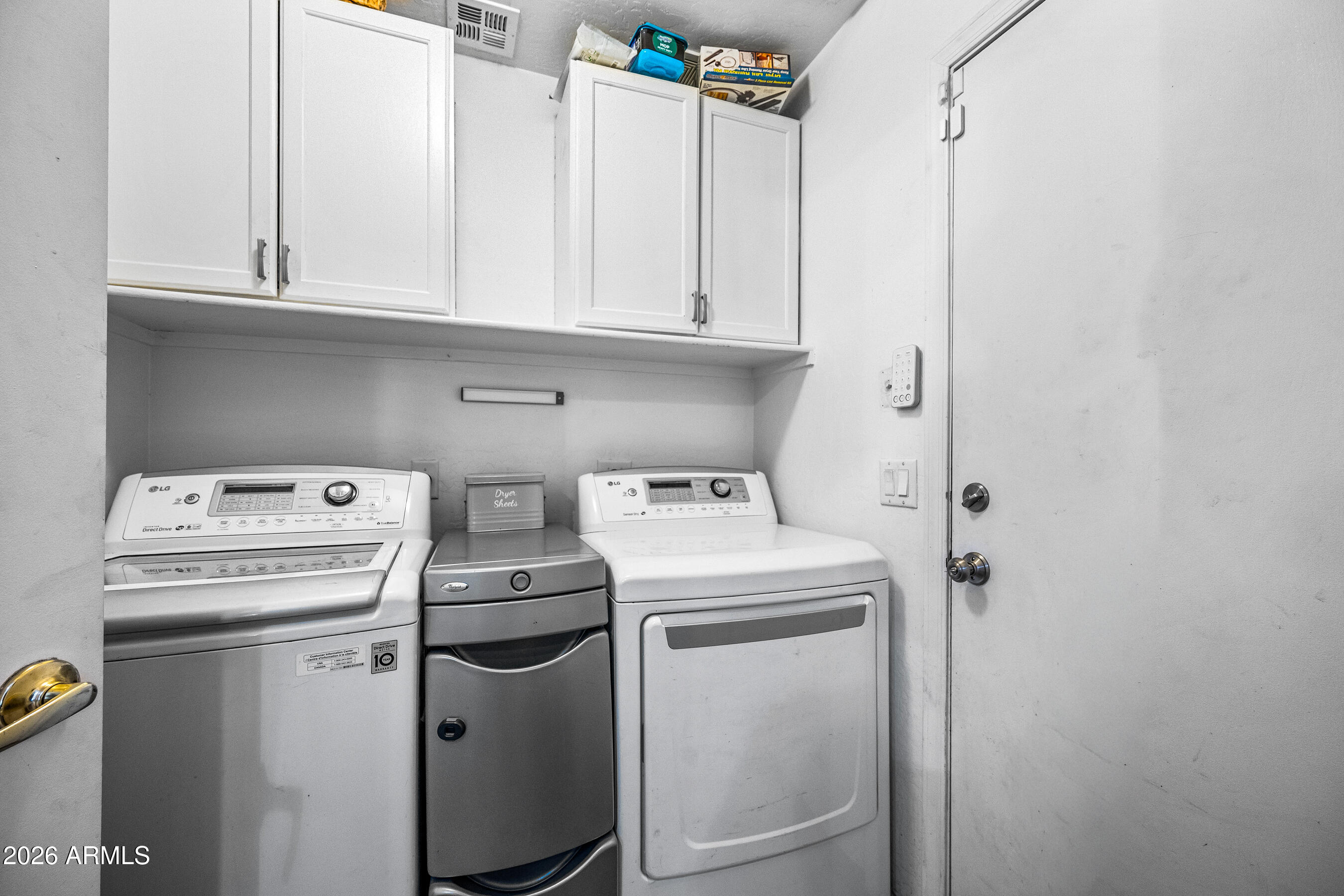 1260 South Lindsay Road, Unit 38 Mesa, AZ 85204 - Photo 18 of 23 a utility room with dryer and washer
