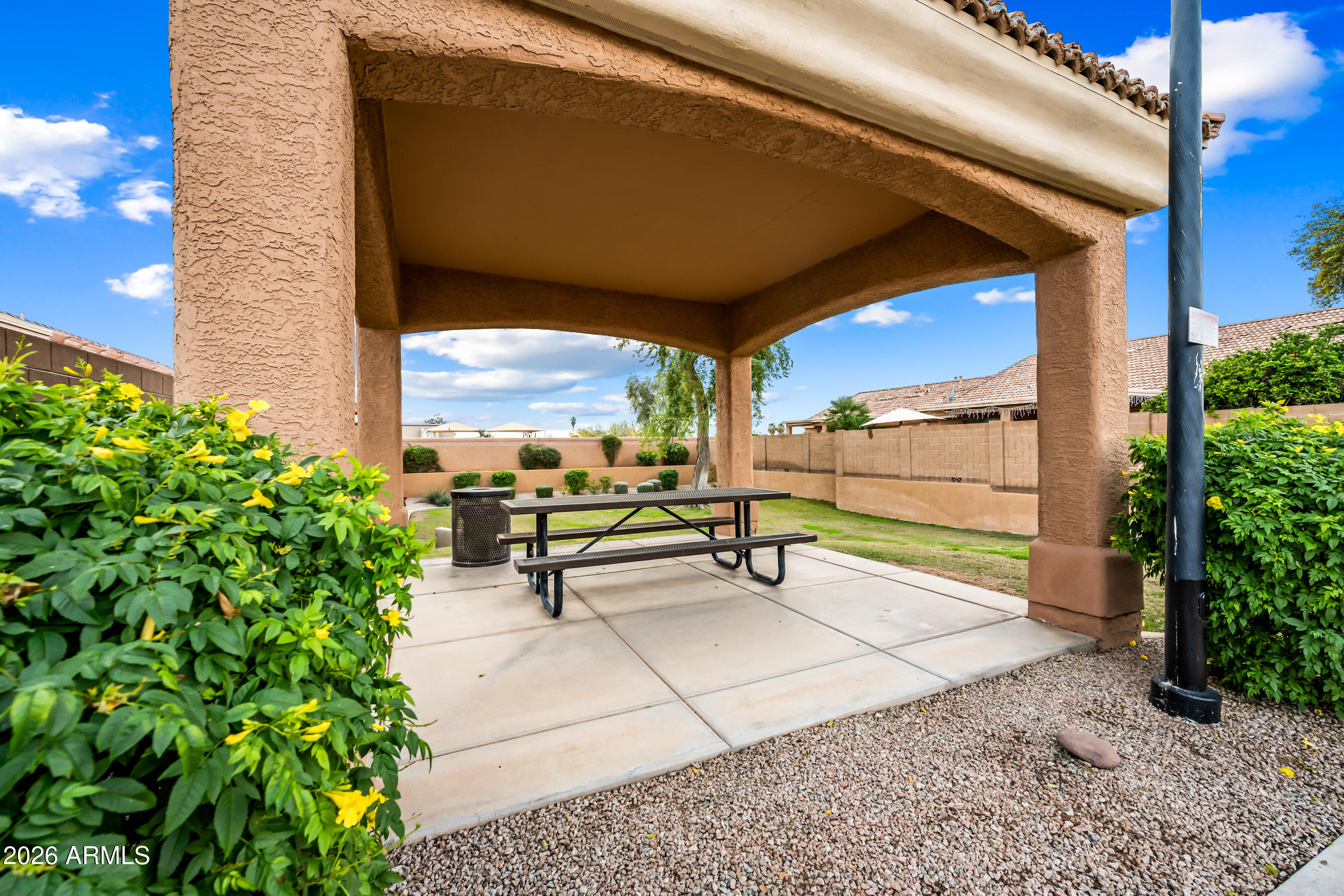 1260 South Lindsay Road, Unit 38 Mesa, AZ 85204 - Photo 23 of 23 a bench sitting in the middle of a building