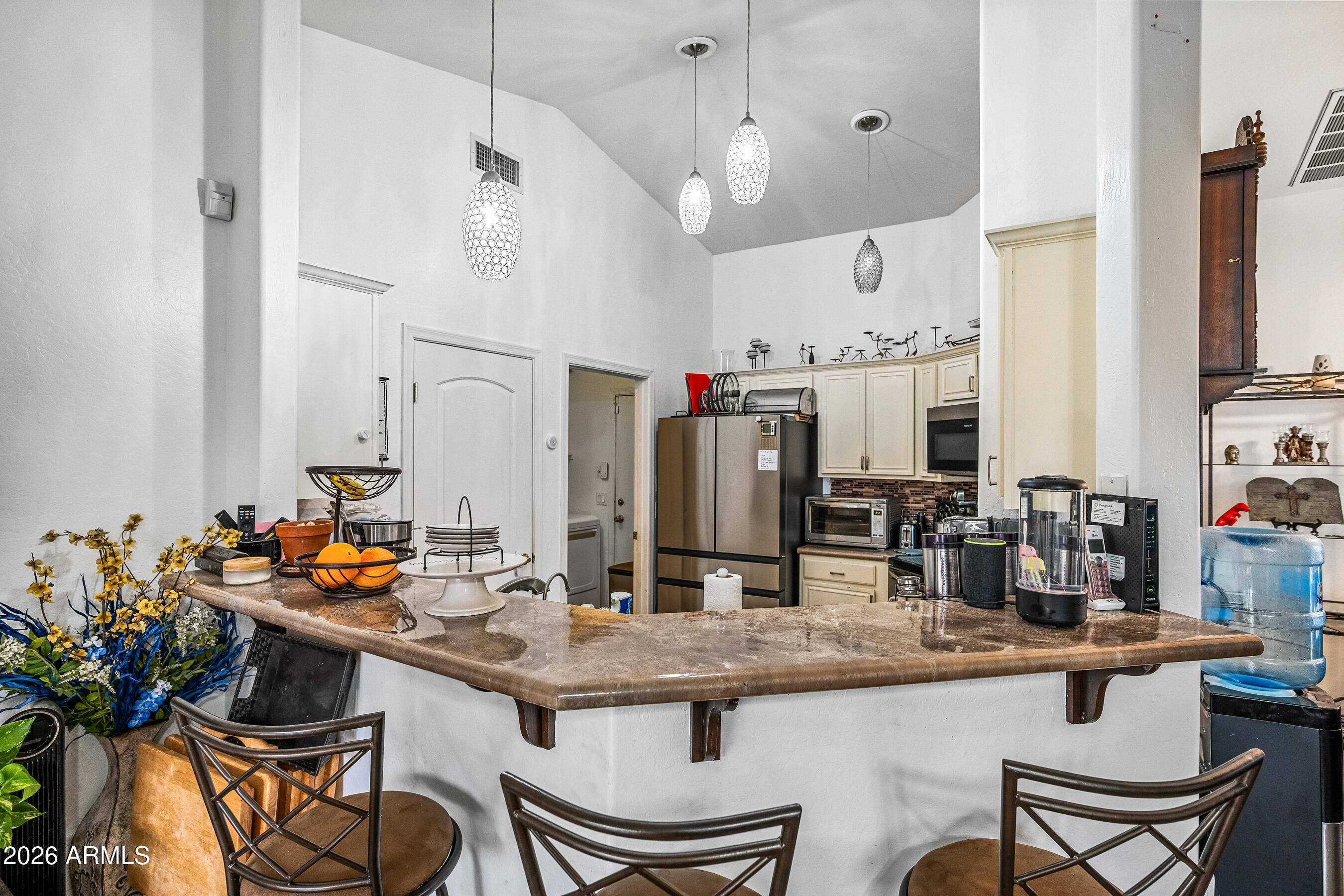 1260 South Lindsay Road, Unit 38 Mesa, AZ 85204 - Photo 7 of 23 a kitchen with a sink and stove