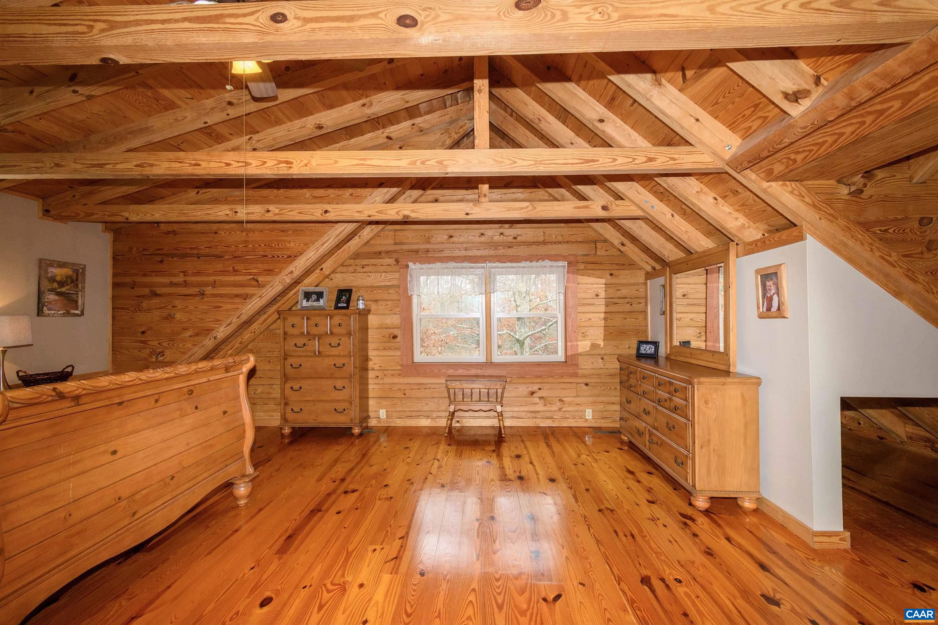 11441 Old Lawyers Road Unionville, VA 22567 - Photo 21 of 45 a view of a living room with a wooden floor