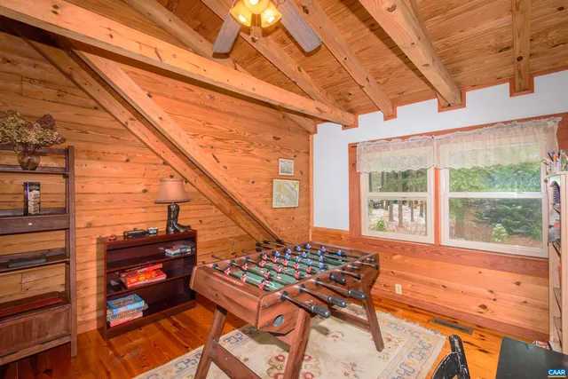 a living room with a rug