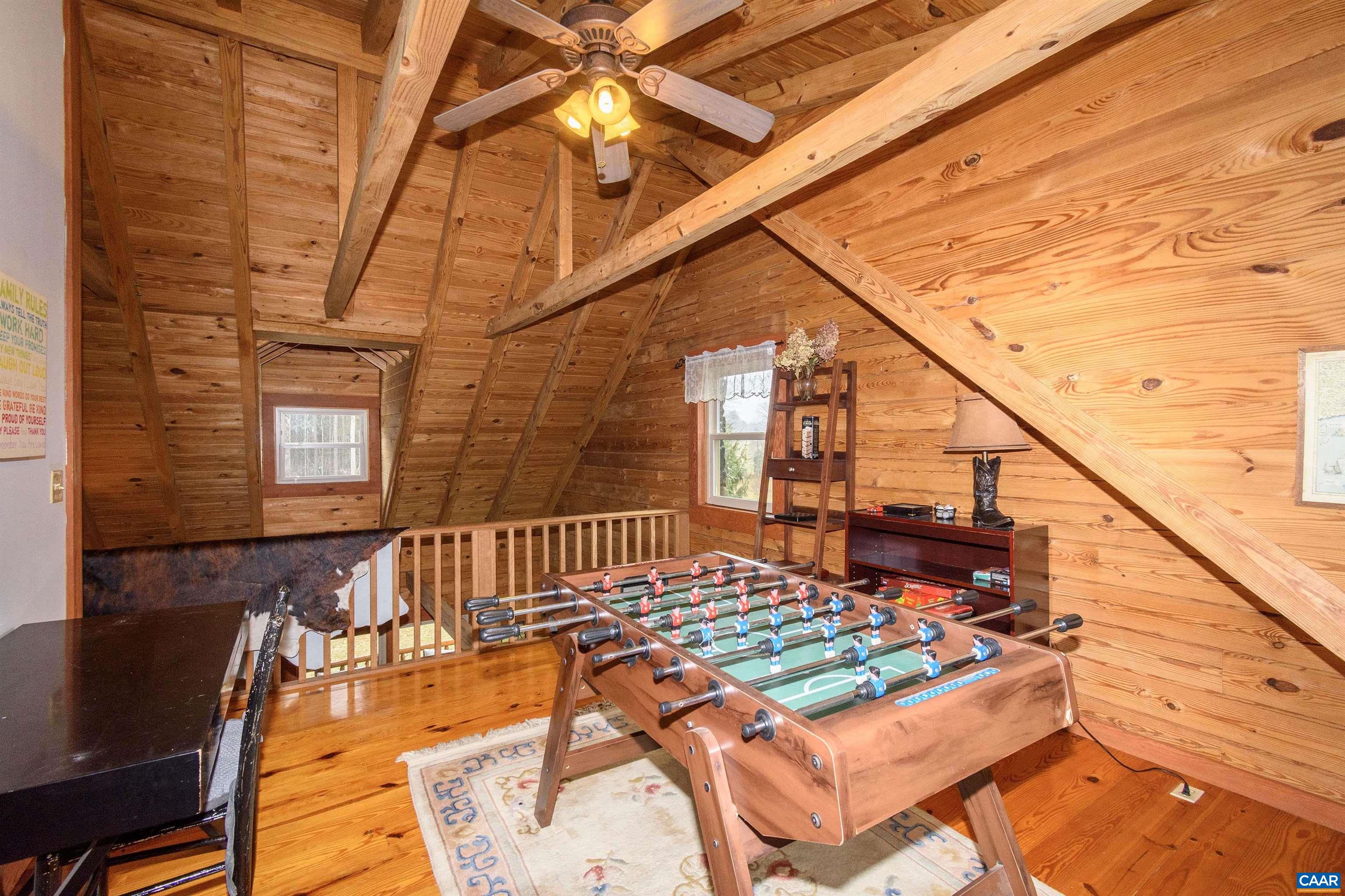 11441 Old Lawyers Road Unionville, VA 22567 - Photo 23 of 45 a living room with a rug