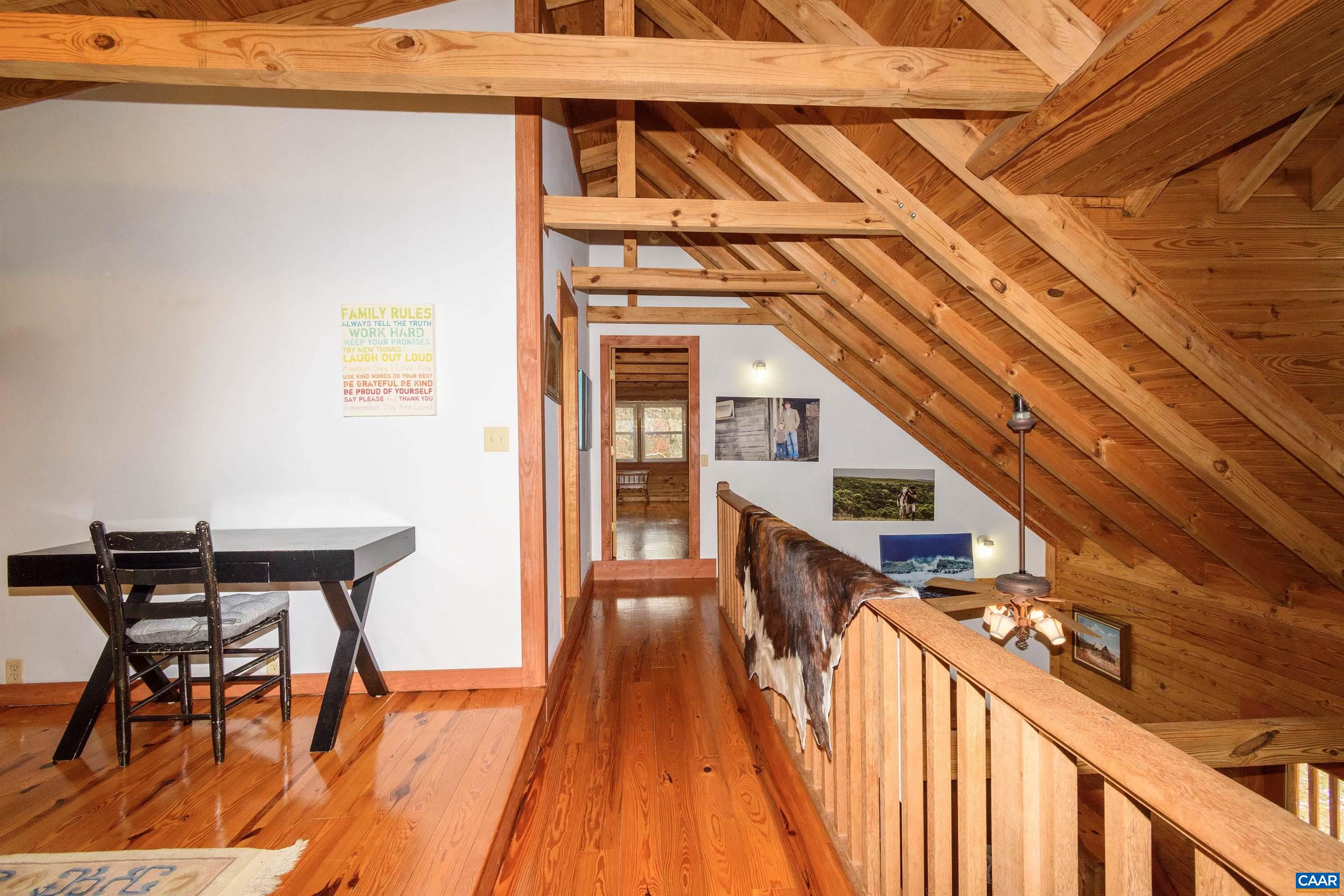 11441 Old Lawyers Road Unionville, VA 22567 - Photo 24 of 45 a view of a balcony with chairs