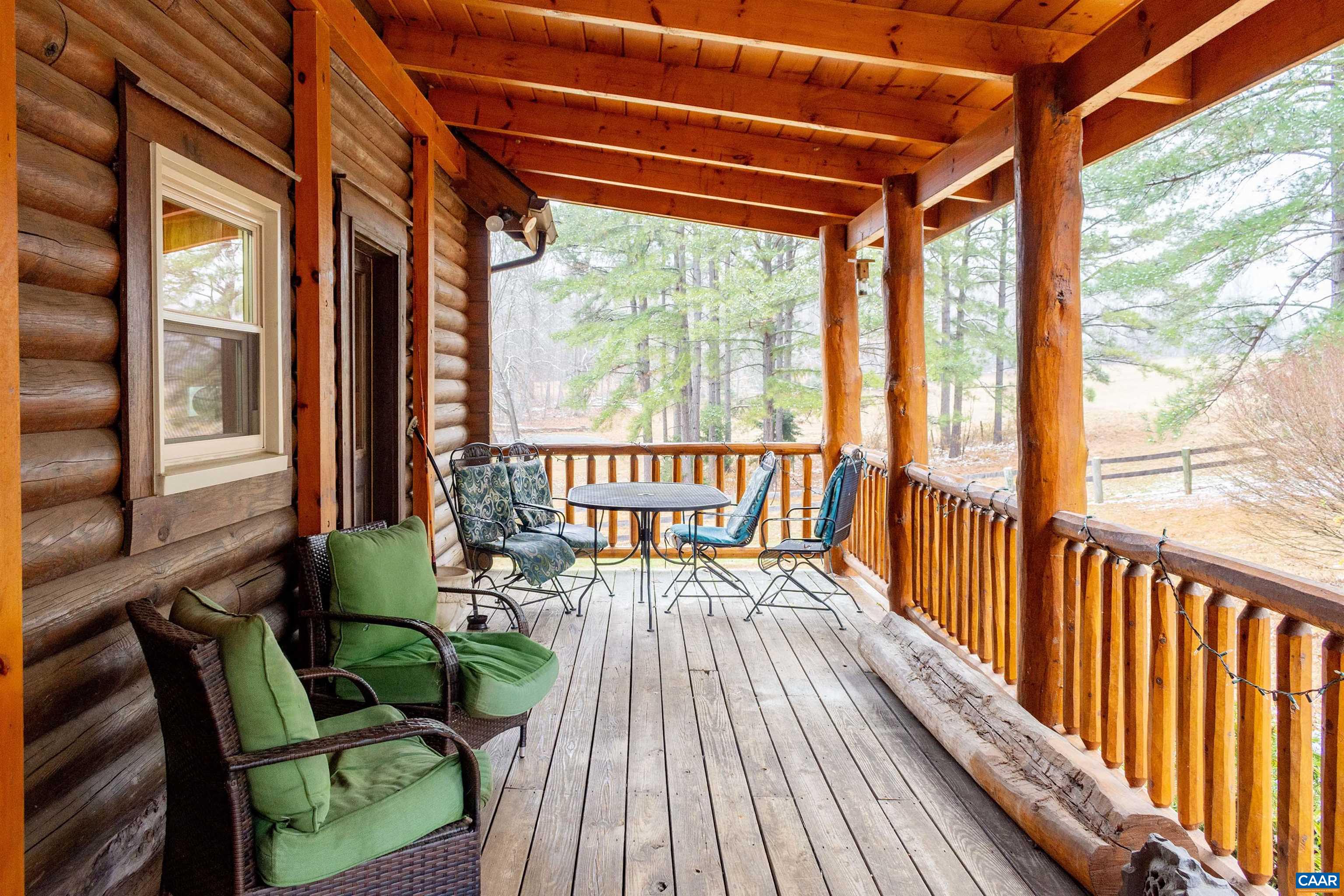 11441 Old Lawyers Road Unionville, VA 22567 - Photo 41 of 45 a view of balcony with furniture and wooden floor