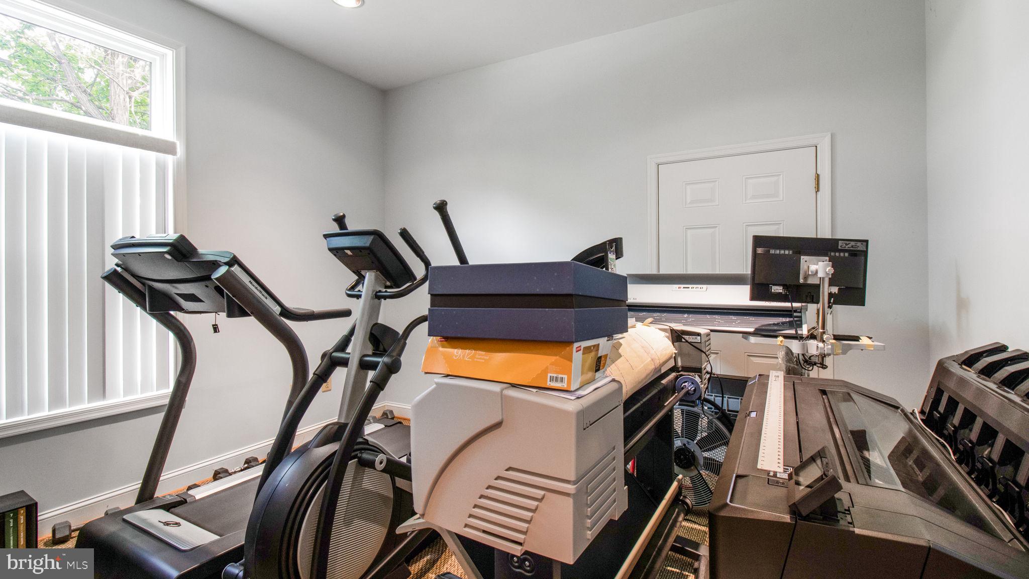 2816 Old Briggs Chaney Road Silver Spring, MD 20905 - Photo 47 of 93 a view of a room with gym equipment