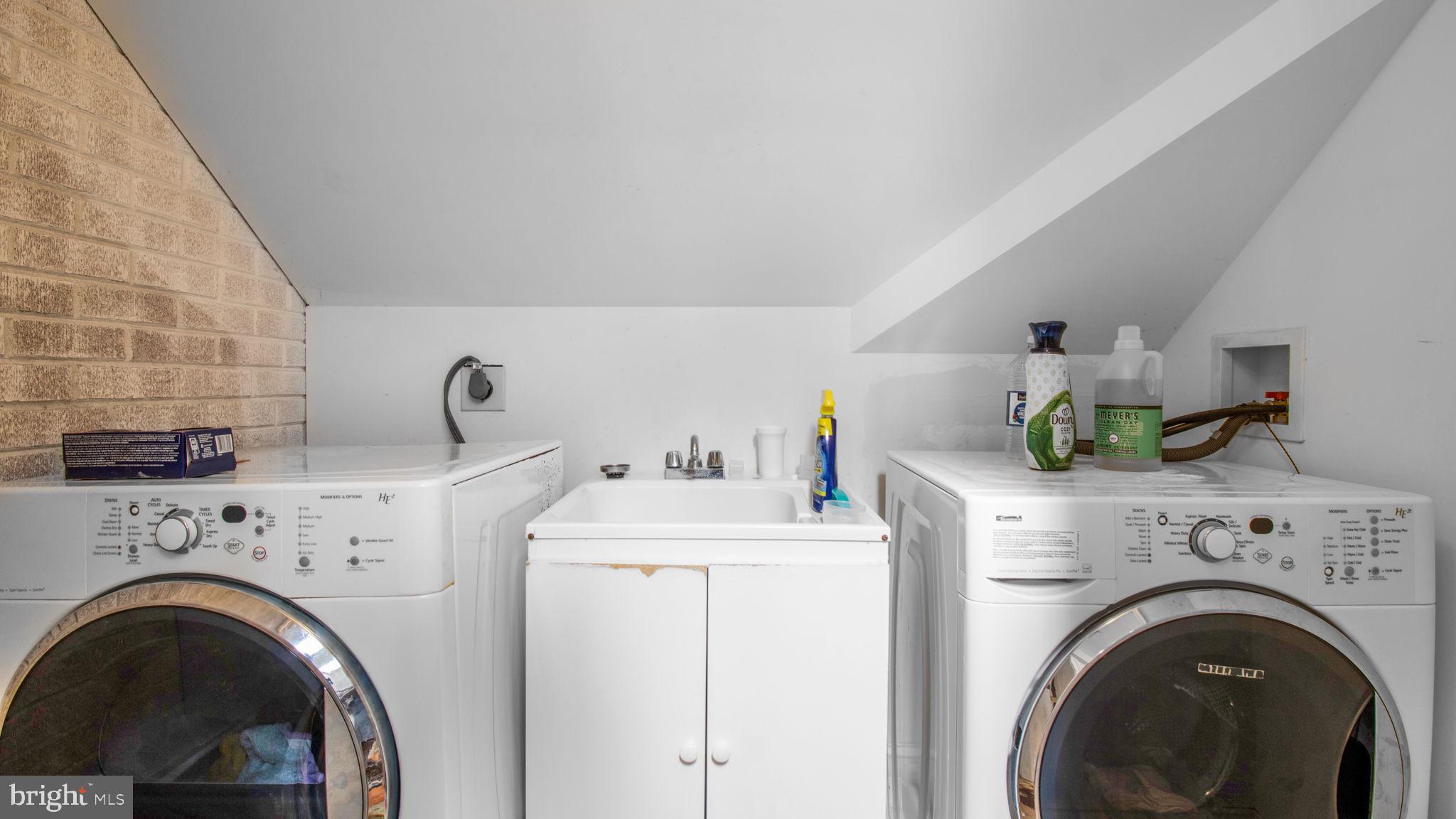 2816 Old Briggs Chaney Road Silver Spring, MD 20905 - Photo 68 of 93 a utility room with dryer and washer