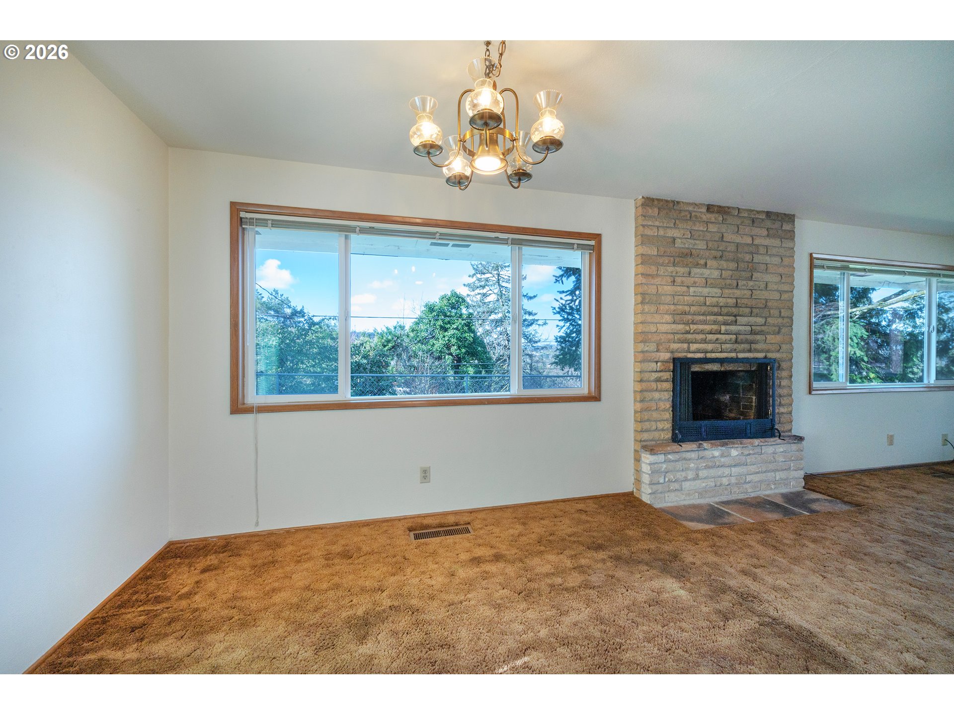 3392 Onyx Place Eugene, OR 97405 - Photo 11 of 41 a view of an empty room with a window