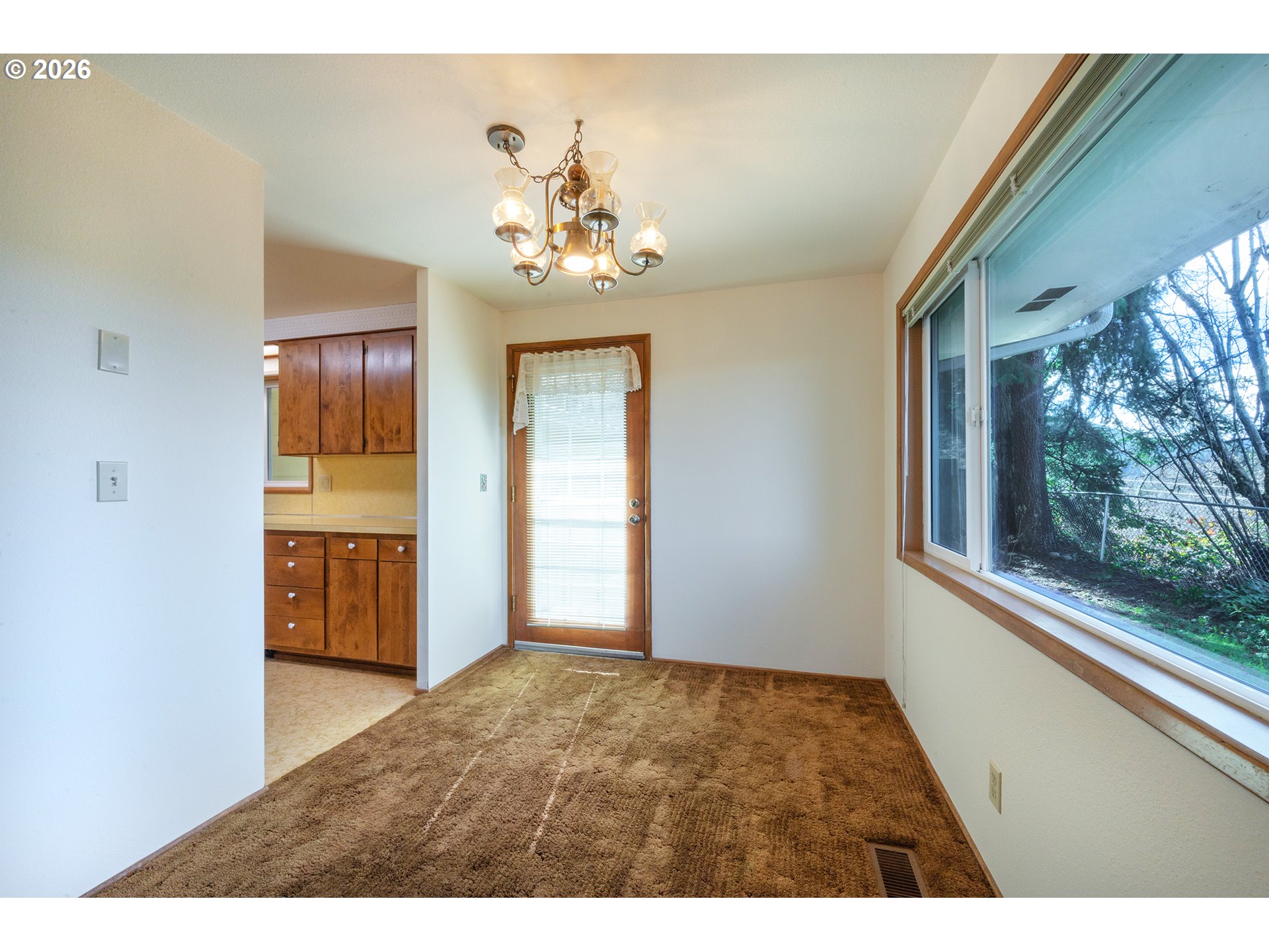 3392 Onyx Place Eugene, OR 97405 - Photo 13 of 41 a view of an empty room with a window