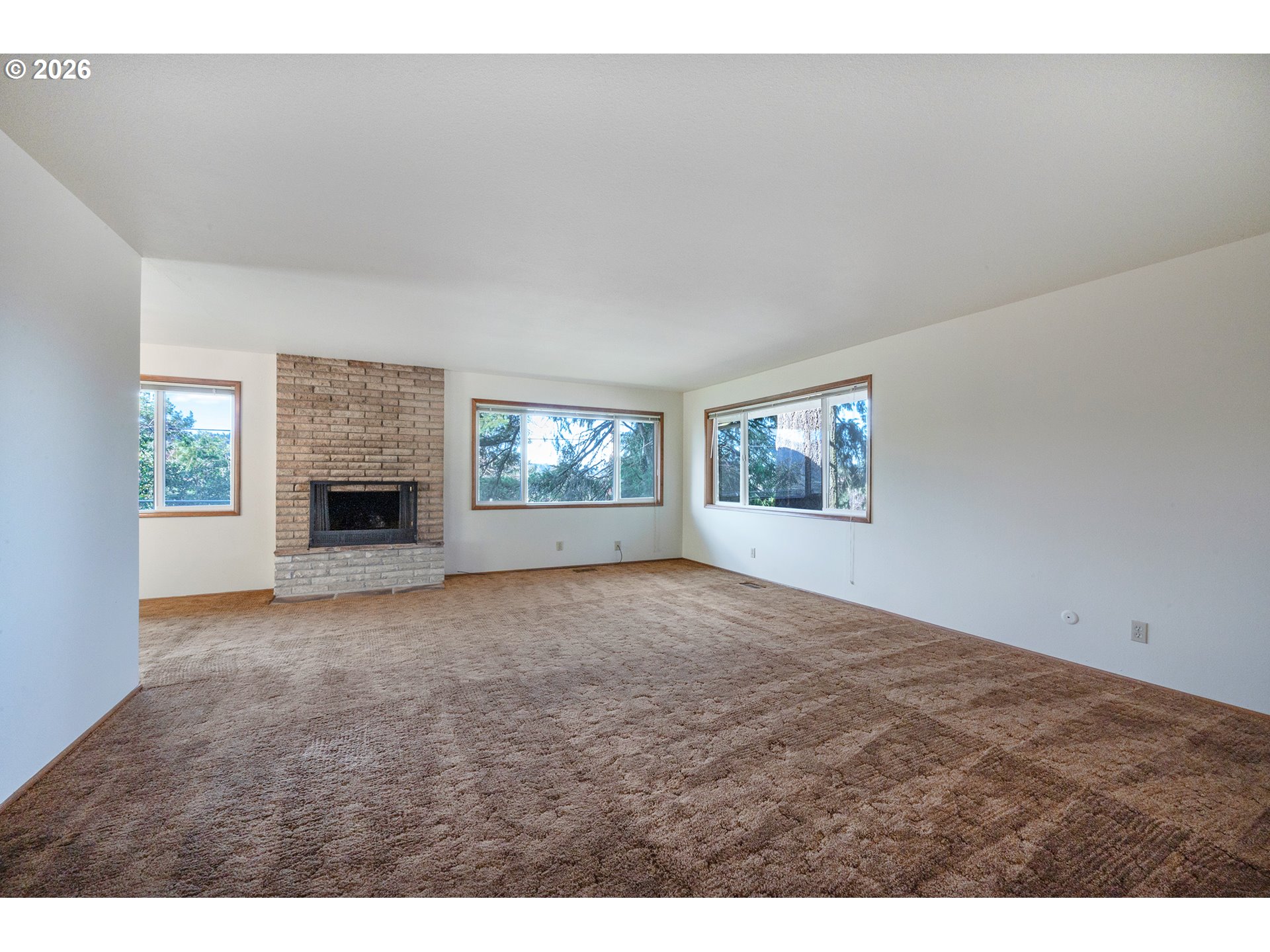 3392 Onyx Place Eugene, OR 97405 - Photo 19 of 41 a view of an empty room with a window
