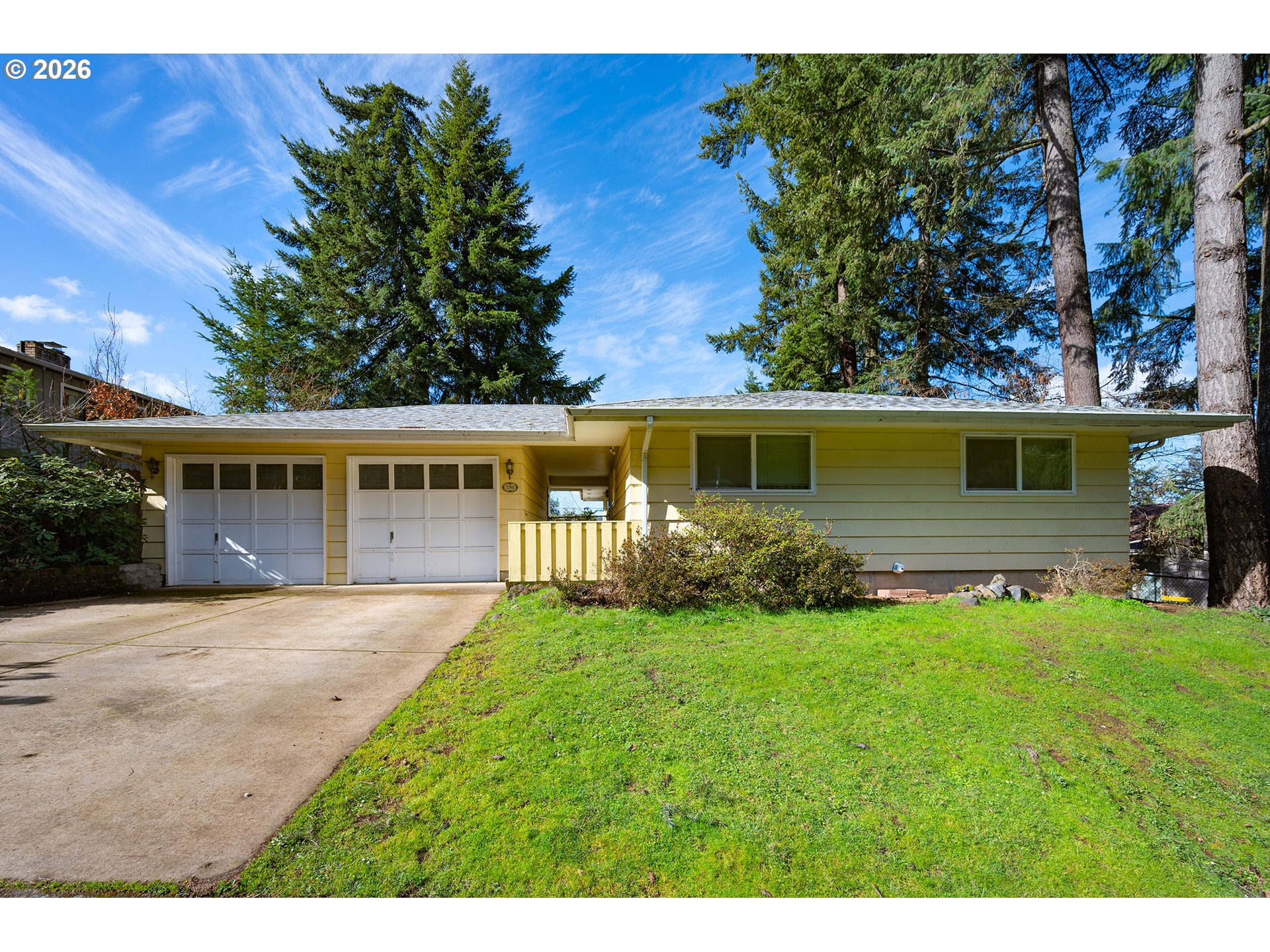 3392 Onyx Place Eugene, OR 97405 - Photo 2 of 41 a front view of a house with a yard