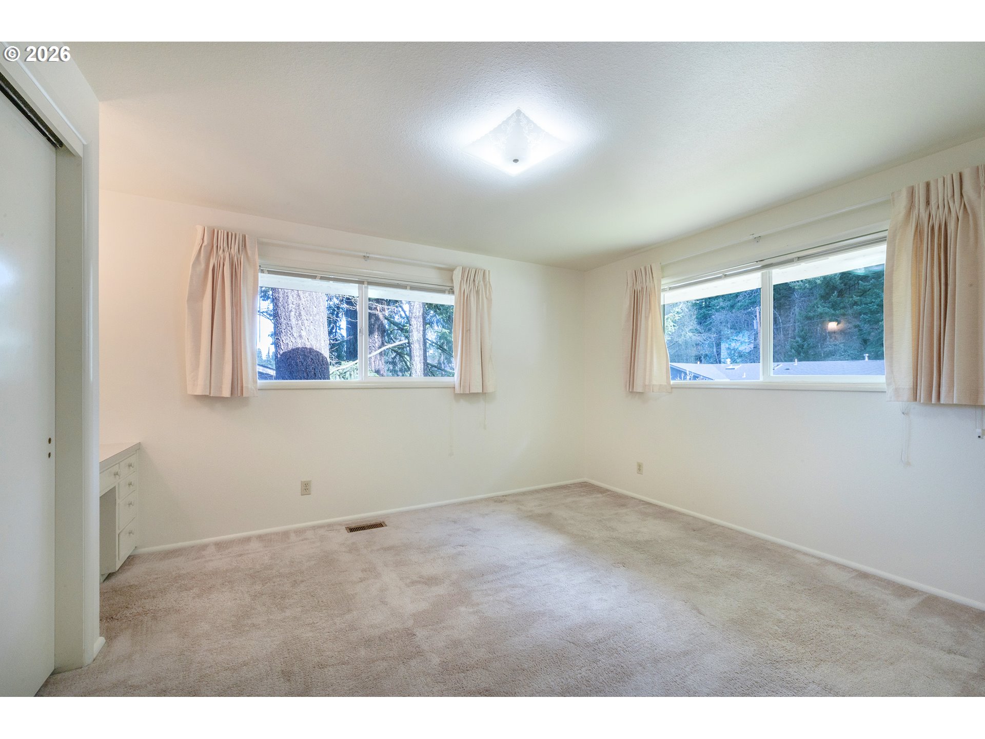 3392 Onyx Place Eugene, OR 97405 - Photo 29 of 41 a view of an empty room with a window