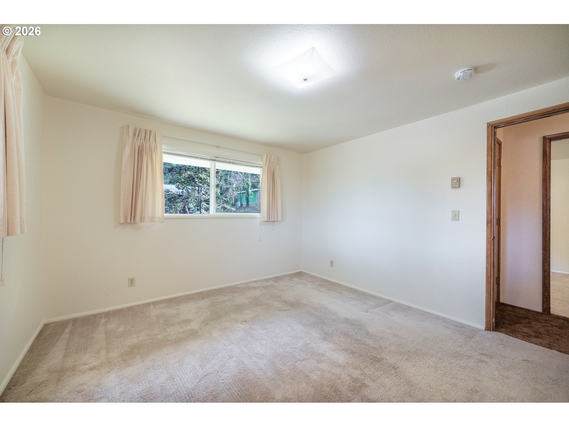 3392 Onyx Place Eugene, OR 97405 - Photo 30 of 41 an empty room with windows