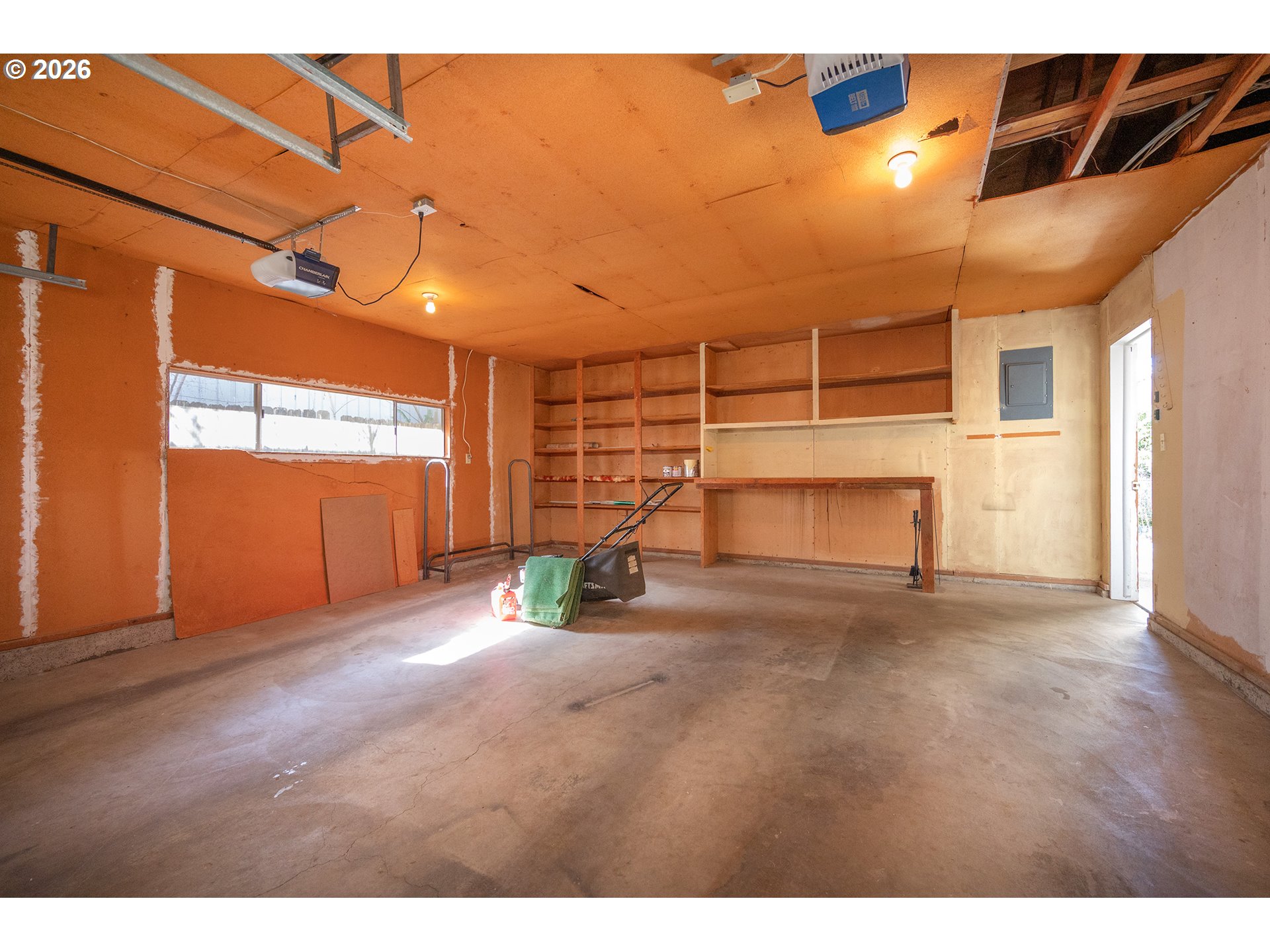 3392 Onyx Place Eugene, OR 97405 - Photo 35 of 41 a view of empty room with wooden floor and windows