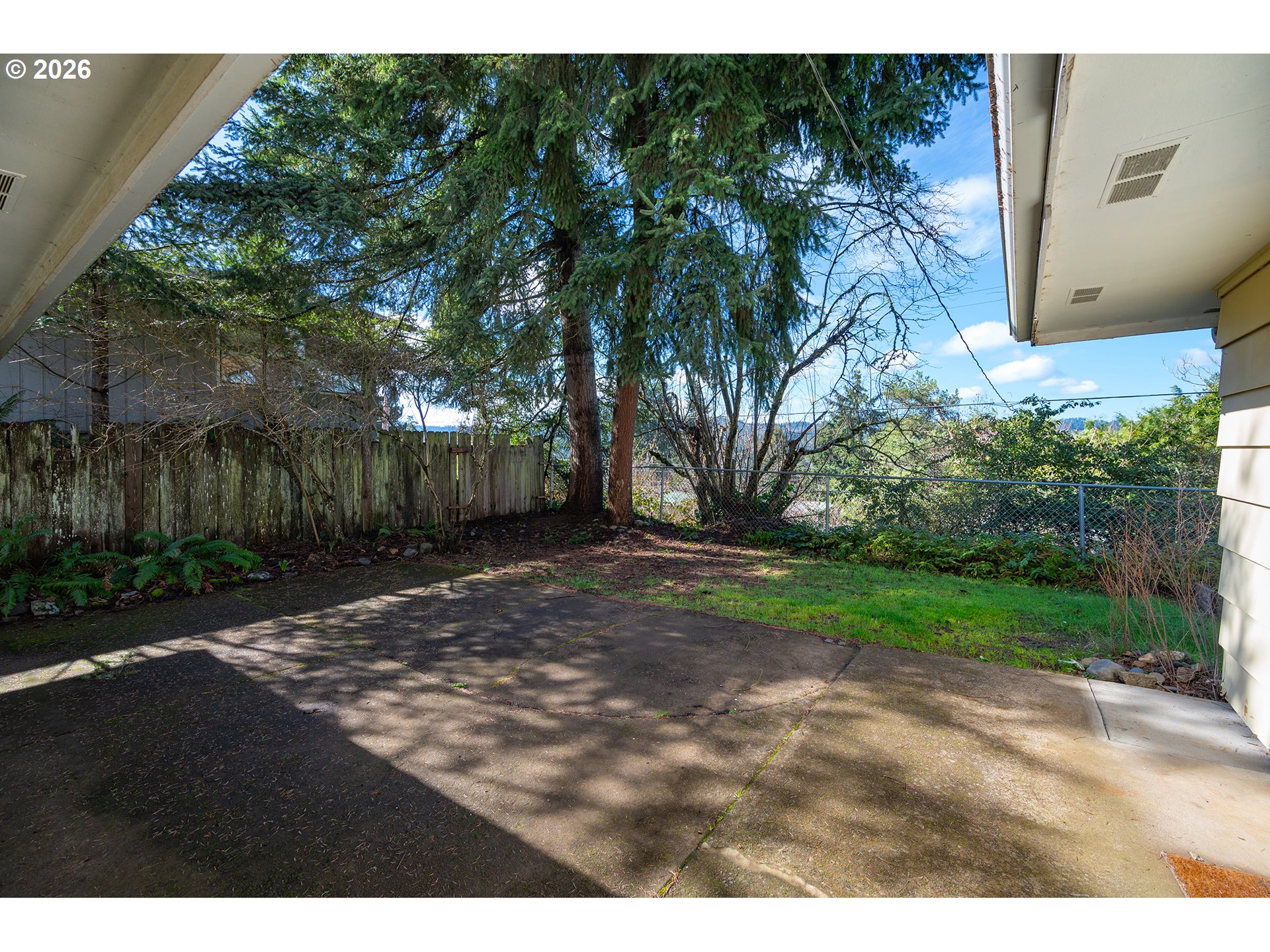 3392 Onyx Place Eugene, OR 97405 - Photo 36 of 41 a view of a yard with plants and trees