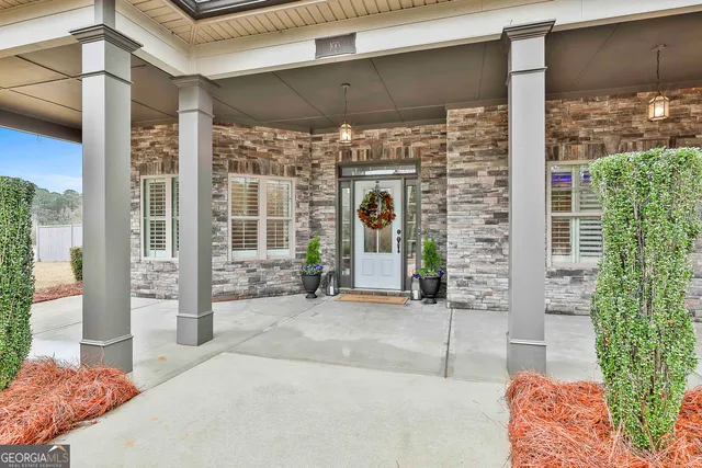 a view of a entryway door front of house