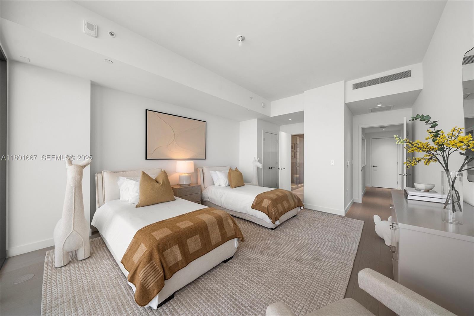 500 Alton Road, Unit 3602 Miami Beach, FL 33139 - Photo 23 of 33 a bedroom with a bed and a couch