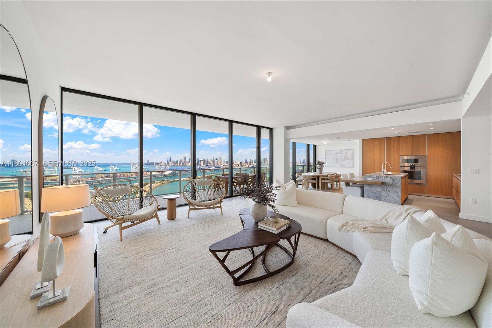 500 Alton Road, Unit 3602 Miami Beach, FL 33139 - Photo 3 of 33 a living room with furniture and a large window