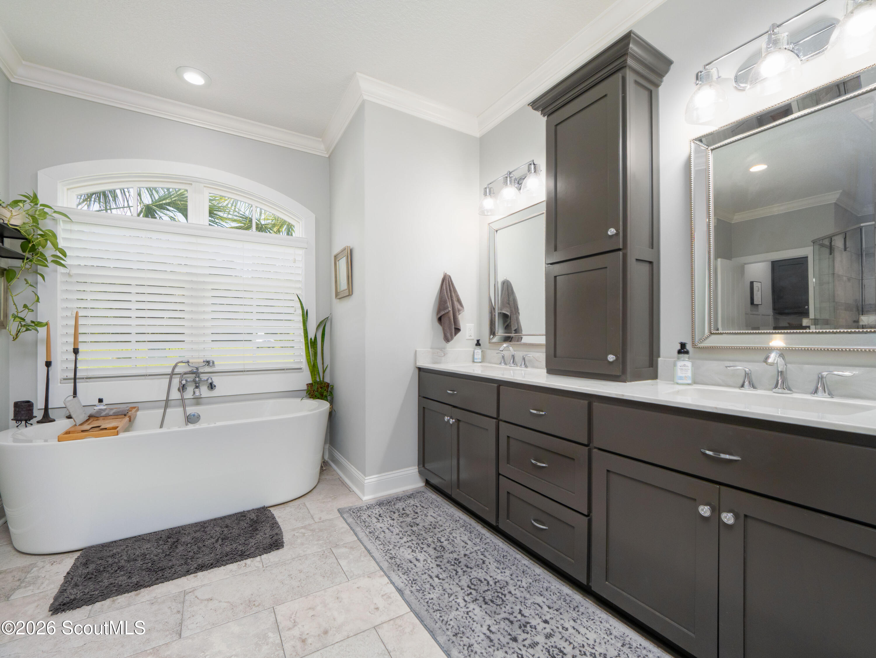 79 Manatee Court Waverly, GA 31565 - Photo 27 of 56 Primary bathroom with double vanity and tub